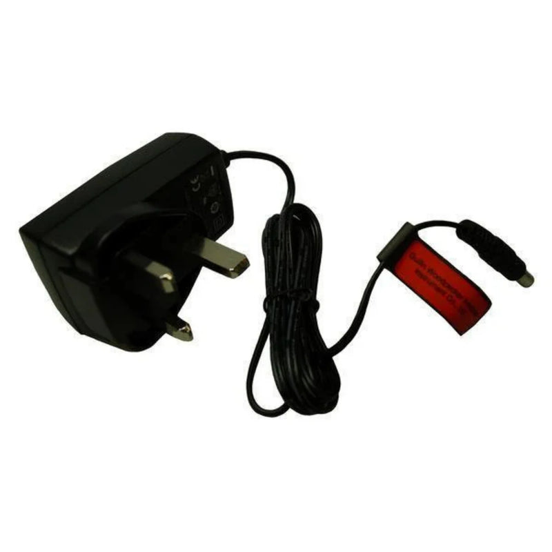 A black transformer/charger with a red label, cable, and plug.