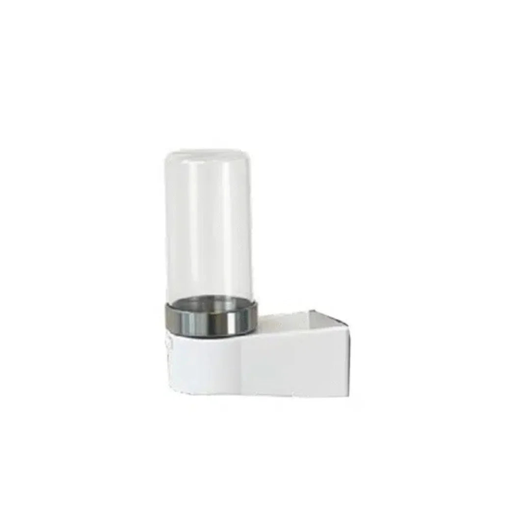 White wall-mounted soap dispenser with clear cylindrical container on a white background